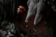 <p>Rescue workers are seen in the Tham Luang cave during a search for 12 members of an under-16 soccer team and their coach, in the northern province of Chiang Rai, Thailand, June 27, 2018. (Photo: Soe Zeya Tun/Reuters) </p>