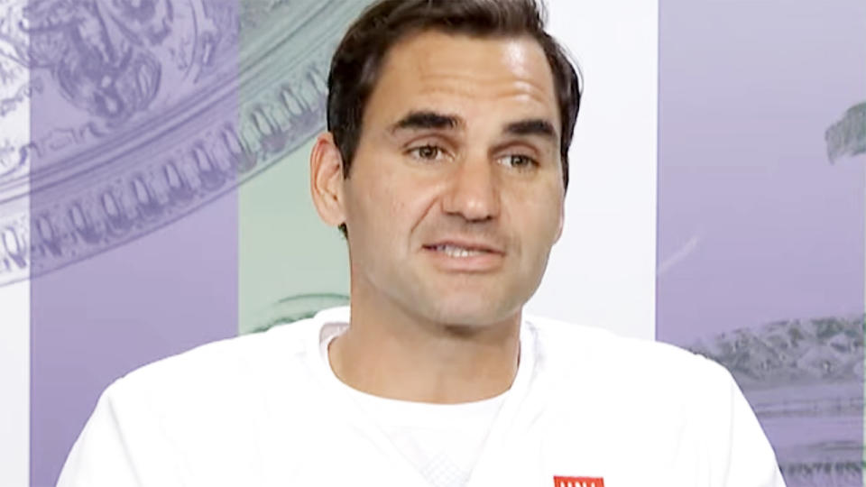 Roger Federer, pictured here in his post-match press conference at Wimbledon.