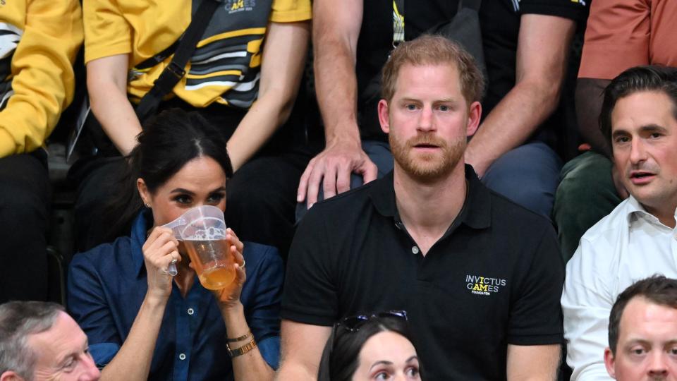 <p> At the 2023 Invictus Games, Meghan Markle was on hand once again to support the charity so near to her husband, Prince Harry. </p> <p> Harry, himself a military veteran, set up the foundation to support those who have been injured while serving. With an annual competitive games tournament - which aims to rethink the limitations of those with disabilities or injuries after serving - it's an event Harry never misses. </p> <p> We love that Meghan always supports, and we love that she didn't hesitate getting into the swing of things by enjoying a beverage while taking in one of the games. </p>