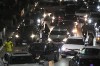 Heavy traffic is seen at the O'Hare International Airport in Chicago, Thursday, Dec. 21, 2023. It's beginning to look a lot like a hectic holiday travel season, but it might go relatively smoothly if the weather cooperates. (AP Photo/Nam Y. Huh)