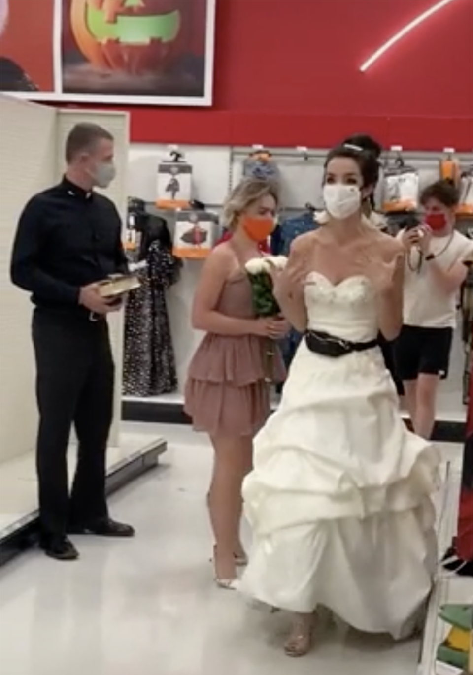 The bride-to-be brought a bridesmaid and a pastor up the aisles as she searched for her unsuspecting fiancé. Photo: TikTok/@boymom_ashley