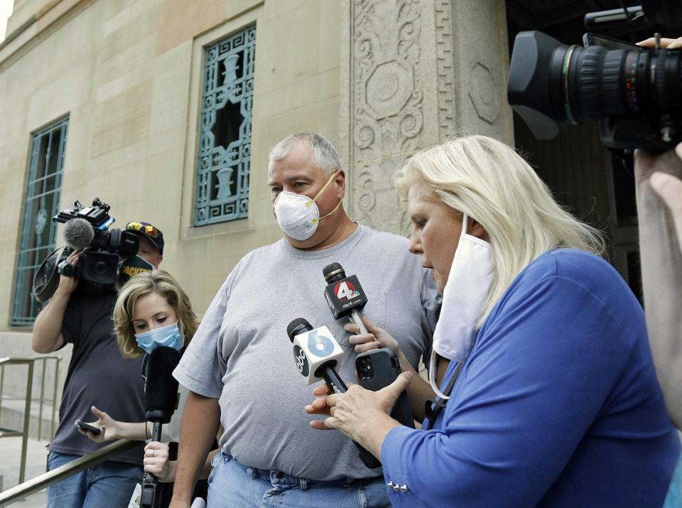 Ohio House Speaker Larry Householder walks out of U.S. District Court in July 2020 after federal charges that he participated in a racketeering conspiracy.