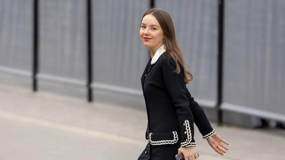 Princess Alexandra of Hanover attends the Chanel Haute Couture Spring/Summer 2024 show in a black blazer, skirt, sheer tights and black heels