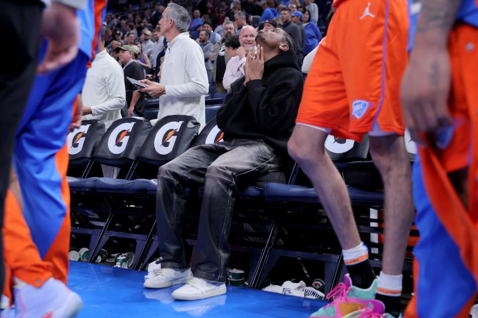 Oklahoma City Thunder guard Shai Gilgeous-Alexander sits on the bench during the final seconds of regulation in an NBA basketball game between the Oklahoma City Thunder and the Houston Rockets at Paycom Center in Oklahoma City, Wednesday, March 27, 2024. Houston won 132-126.