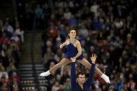 Meagan Duhamel and Eric Radford of Canada compete. REUTERS/Brian Snyder