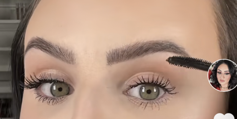 Mikayla Nogueira applying mascara