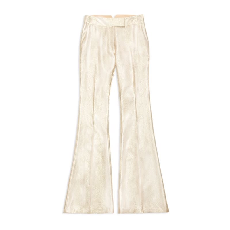 <a rel="nofollow noopener" href="https://shoprachelzoe.com/shop/new-arrivals/rena-flared-metallic-trousers/?attribute_pa_color=gold" target="_blank" data-ylk="slk:Rena Flared Metallic Trousers, Rachel Zoe, $395;elm:context_link;itc:0;sec:content-canvas" class="link ">Rena Flared Metallic Trousers, Rachel Zoe, $395</a><p> <strong>Related Articles</strong> <ul> <li><a rel="nofollow noopener" href="http://thezoereport.com/fashion/style-tips/box-of-style-ways-to-wear-cape-trend/?utm_source=yahoo&utm_medium=syndication" target="_blank" data-ylk="slk:The Key Styling Piece Your Wardrobe Needs;elm:context_link;itc:0;sec:content-canvas" class="link ">The Key Styling Piece Your Wardrobe Needs</a></li><li><a rel="nofollow noopener" href="http://thezoereport.com/entertainment/celebrities/halle-berry-naked-selfie/?utm_source=yahoo&utm_medium=syndication" target="_blank" data-ylk="slk:Halle Berry Looks Better Naked At 50 Than I Ever Have;elm:context_link;itc:0;sec:content-canvas" class="link ">Halle Berry Looks Better Naked At 50 Than I Ever Have</a></li><li><a rel="nofollow noopener" href="http://thezoereport.com/beauty/skincare/spearmint-tea-clears-acne/?utm_source=yahoo&utm_medium=syndication" target="_blank" data-ylk="slk:Drinking This Tea Can Help Cure Breakouts, According To The Internet;elm:context_link;itc:0;sec:content-canvas" class="link ">Drinking This Tea Can Help Cure Breakouts, According To The Internet</a></li> </ul> </p>