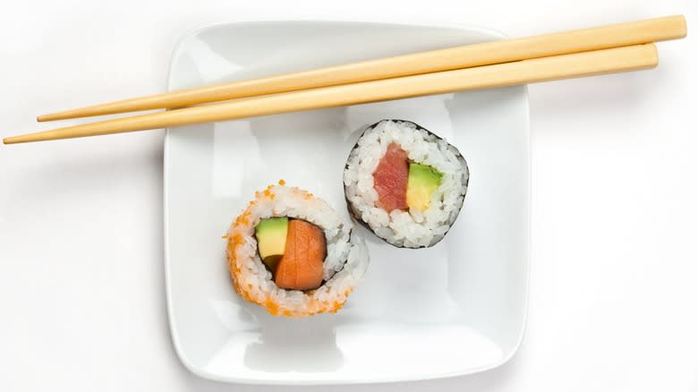 sushi with chosticks 