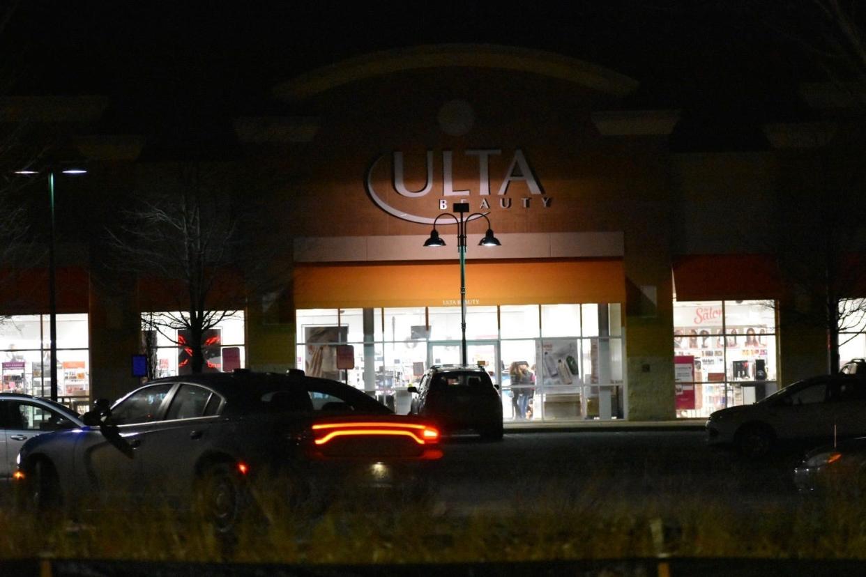 The scene of a shooting and what police said was an organized retail fraud outside the Ulta Beauty store at the Green Oak Village Place mall on Thursday, Jan. 12, 2023. Police said five suspects were in custody but that no one was injured.