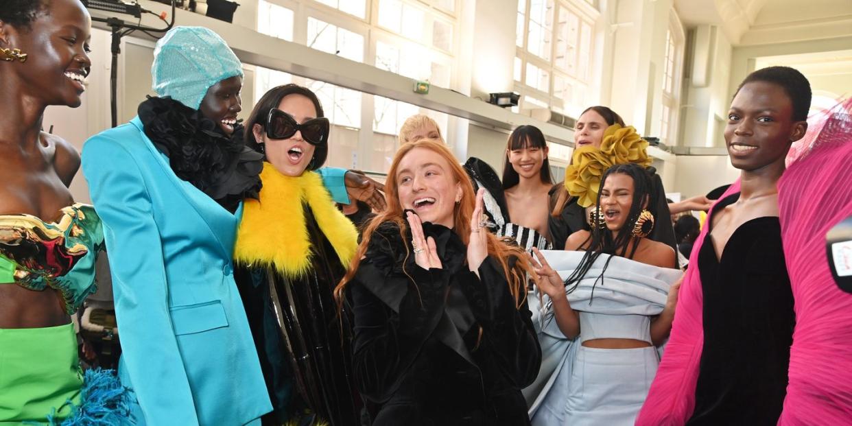 paris, france march 02 harris reed c poses with models backstage at the nina ricci womenswear fall winter 2023 2024 show as part of paris fashion week on march 3, 2023 in paris, france photo by dave benettgetty images