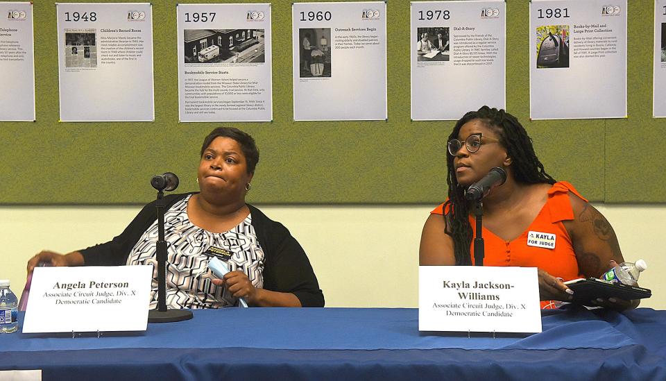 Associate Circuit Judge Division 10 Democratic candidates Angela Peterson, left, and Kayla Jackson-Williams answer questions Thursday at the League of Women Voters Forum at the Columbia Public Library.