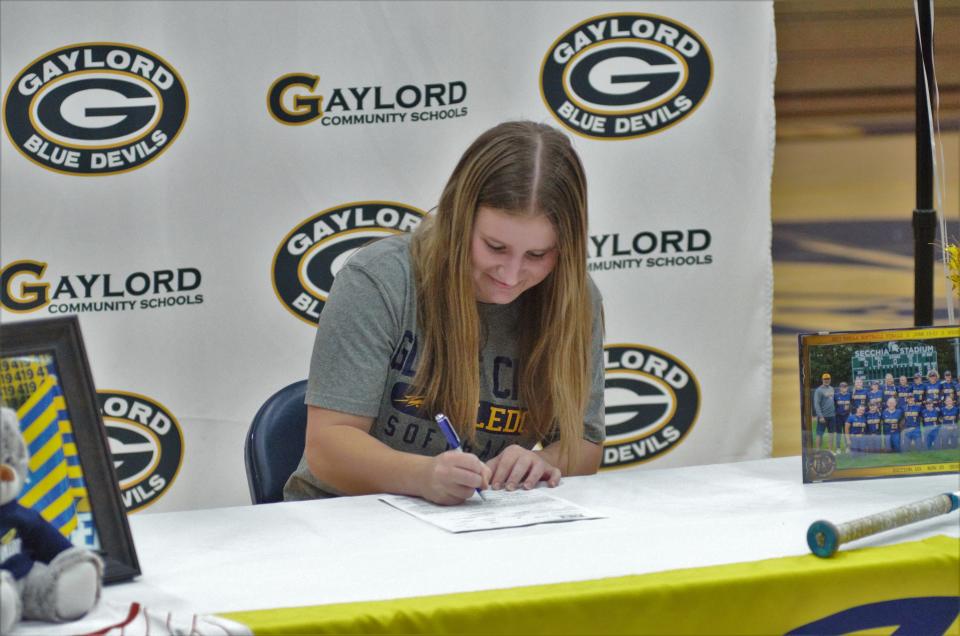 Alexis Shepherd signs her letter of intent to play softball at University of Toledo during a ceremony on Wednesday, Dec. 20 at Gaylord High School.