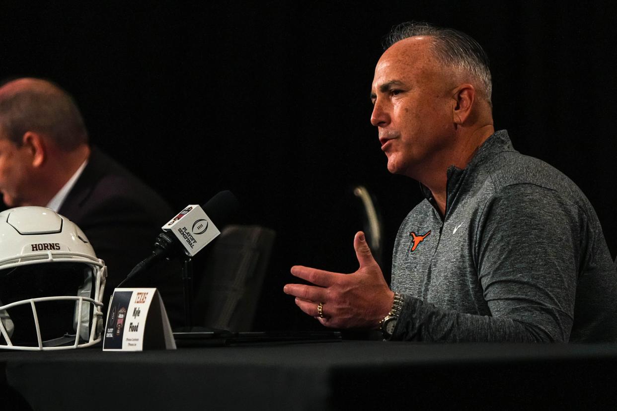 Texas offensive coordinator and offensive line coach Kyle Flood speaks to the media before a College Football Playoff semifinal against Washington in January. Flood and Texas head coach Steve Sarkisian picked up a commitment from Port Neches-Groves offensive lineman Jackson Christian on Monday.