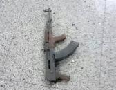 A weapon is seen on the floor at Ataturk airport after suicide bombers opened fire before blowing themselves up at the entrance, in Istanbul, Turkey June 28, 2016. Courtesy of 140journo/via Reuters