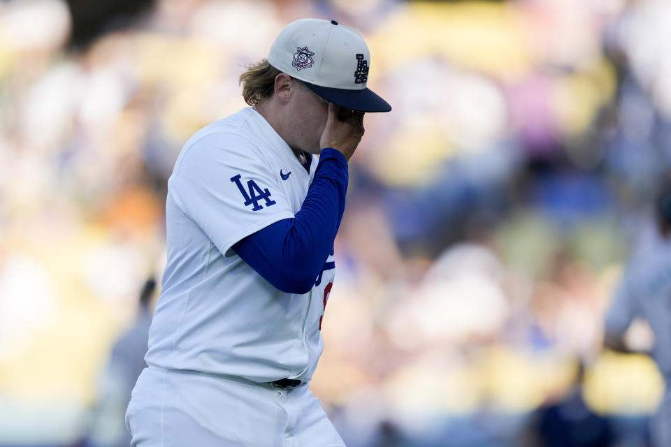 Los Angeles Dodgers starting pitcher Landon Knack reacts while walking off the mound during the first inning of a baseball game against the Arizona Diamondbacks, Thursday, July 4, 2024, in Los Angeles. (AP Photo/Ryan Sun)