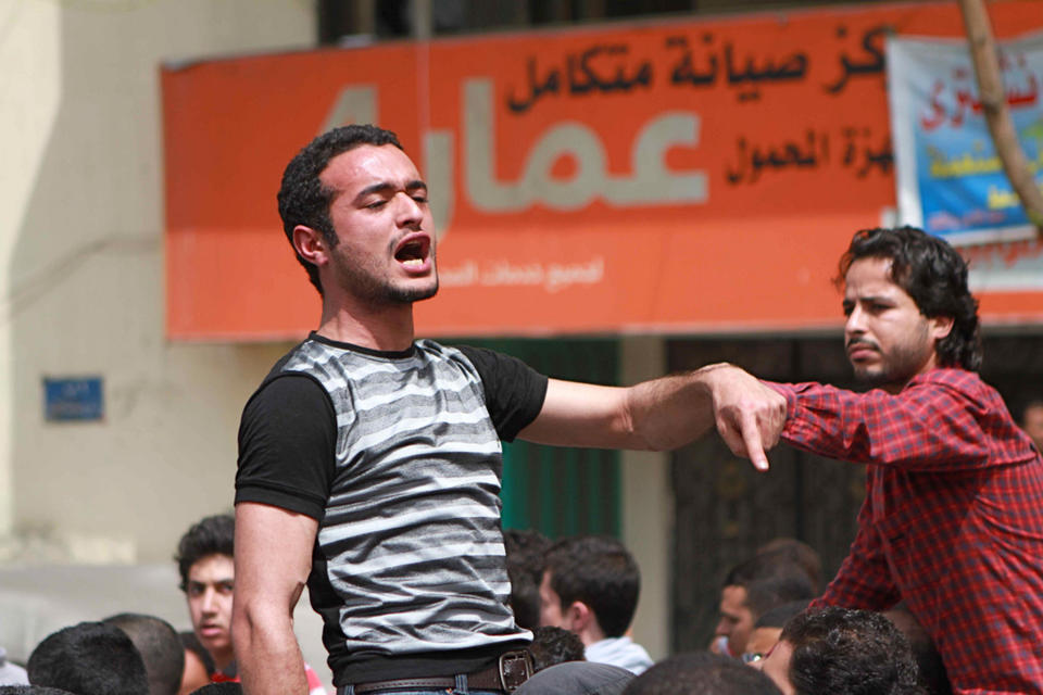 FILE - In this April 1, 2011 photo, activist Ahmed Douma chants slogans during a march to Tahrir Square demanding the prosecution of members of former President Hosni Mubarak's government in Cairo, Egypt. On Monday, April 7, 2014, an Egyptian appeals court has upheld convictions and three-year sentences for three prominent activists — Ahmed Maher, Mohammed Adel and Ahmed Douma. The three were accused of violating a controversial new law on holding protests. The ruling is part of a crackdown by Egypt's military-backed government against the leaders of the 2011 uprising that toppled the regime of autocrat Hosni Mubarak. (AP Photo/Sarah Carr, File)