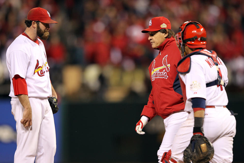 ST LOUIS, MO - OCTOBER 20: Manager Tony La Russa removes pitcher Jason Motte #30 of the St. Louis Cardinals in the ninth inning during Game Two of the MLB World Series against the Texas Rangers at Busch Stadium on October 20, 2011 in St Louis, Missouri. (Photo by Jamie Squire/Getty Images)