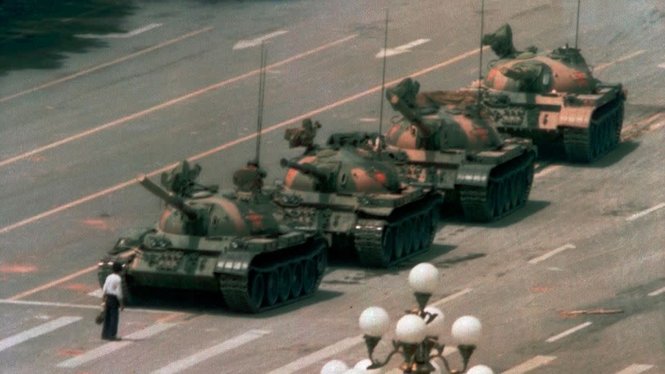 Jeff Widener's iconic "Tank Man" photo on June 5, 1989, showing an unidentified man standing in front of a column of tanks after the Tiananmen Square crackdown in Beijing, China. - Jeff Widener/AP