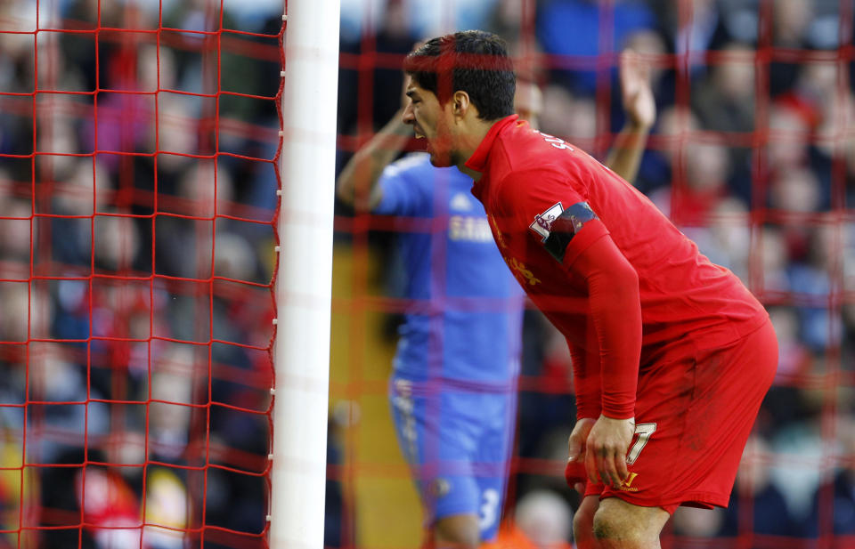 The aftermath: Luis Suarez moments after he appeared to bite Chelsea’s Branislav Ivanovic in 2013