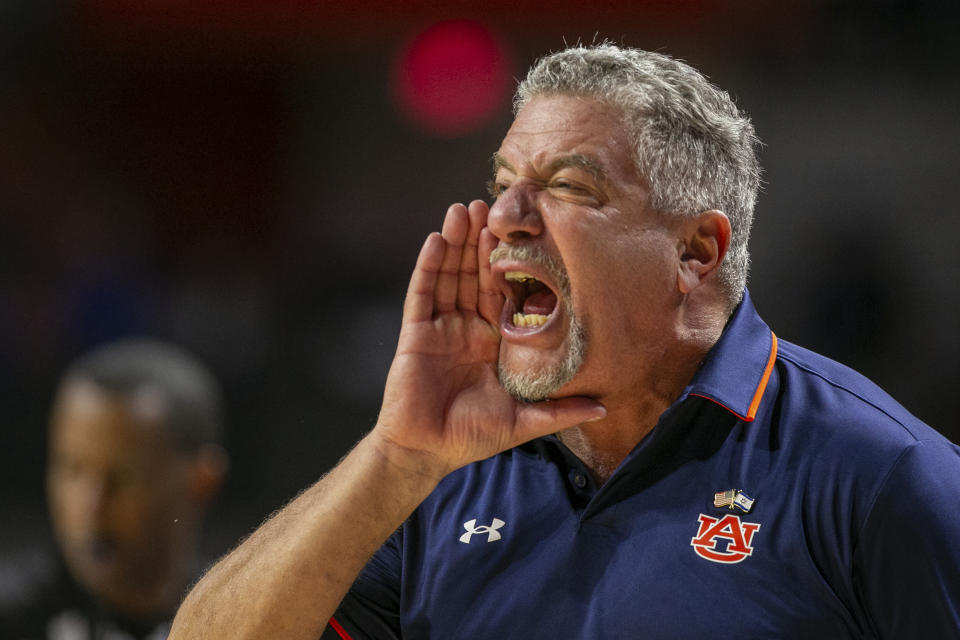 Auburn head coach Bruce Pearl yells during the first half of an NCAA college basketball game against Florida, Saturday, Feb. 10, 2024, in Gainesville, Fla. (AP Photo/Alan Youngblood)