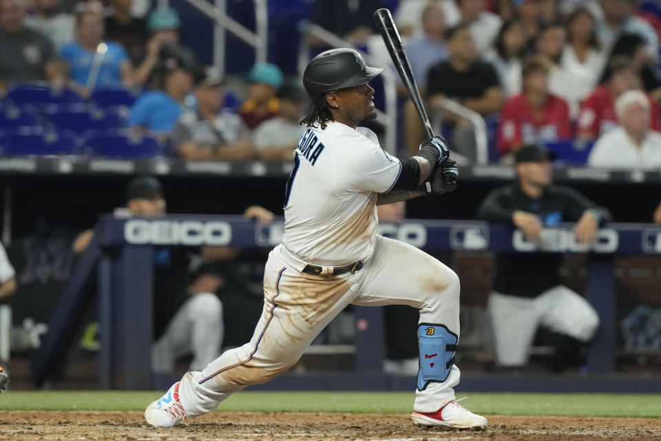 Miami Marlins' Jean Segura hits a home run during the eighth inning of a baseball game against the Detroit Tigers, Sunday, July 30, 2023, in Miami. The Marlins defeated the Tigers 8-6. (AP Photo/Marta Lavandier)