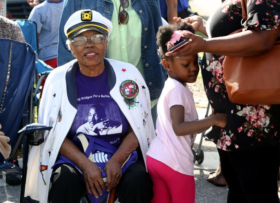 Riviera Beach resident Victoria Kingdom, 91 watches the 36th Annual MLK Gala Parade on Saturday afternoon. On Saturday, January 18, 2020.