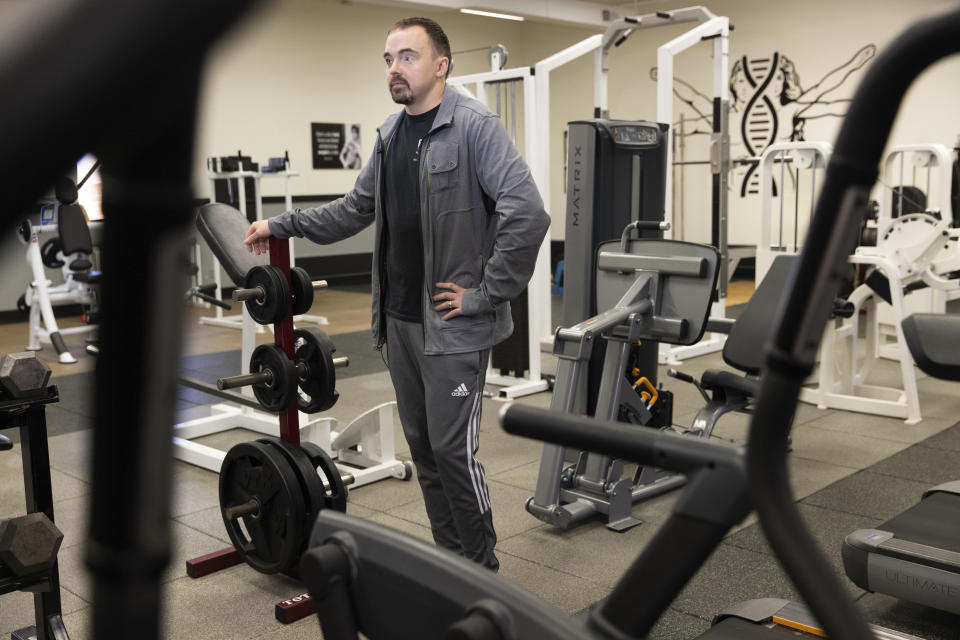 Steven Scott, 34, who owns and operates Re-Gen Fitness and Recovery is photographed on Thursday, Feb. 23, 2023, in Omaha, Neb. Scott was paroled in 2015 after serving more than four years on assault and other charges. Scott said the two-year wait period as one link in a long chain of barriers for those trying to reenter society. (AP Photo/Rebecca S. Gratz)