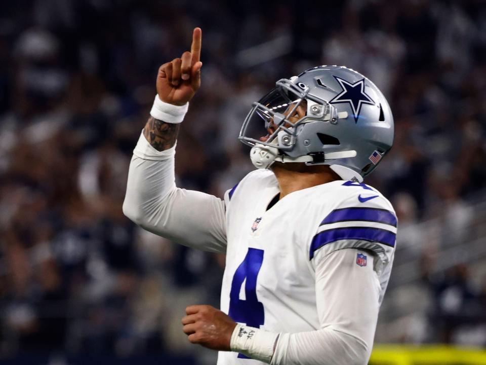 Dak Prescott celebrates a touchdown against Washington.