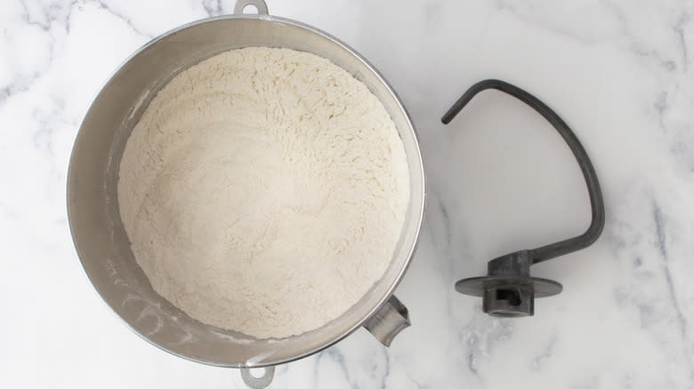 bowl of flour and dough hook