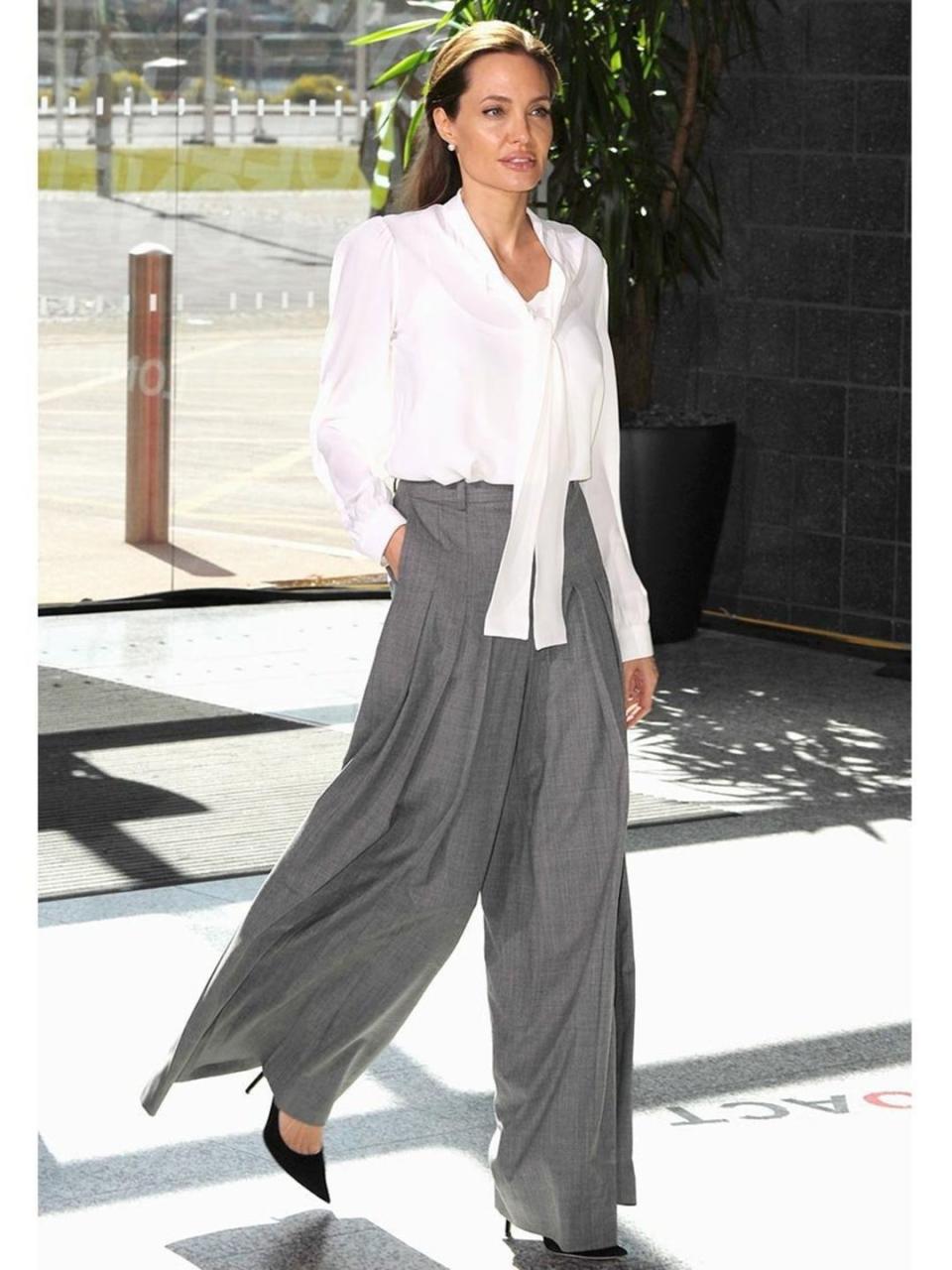 <p>Angelina Jolie wears <a href="http://www.elleuk.com/catwalk/designer-a-z/michael-kors/spring-summer-2014/collection" rel="nofollow noopener" target="_blank" data-ylk="slk:Michael Kors s/s 2014;elm:context_link;itc:0;sec:content-canvas" class="link ">Michael Kors s/s 2014</a> ensemble with Jimmy Choo Abel heels to Day 2 of the Global Summit to end Sexual Violence in Conflict.</p>