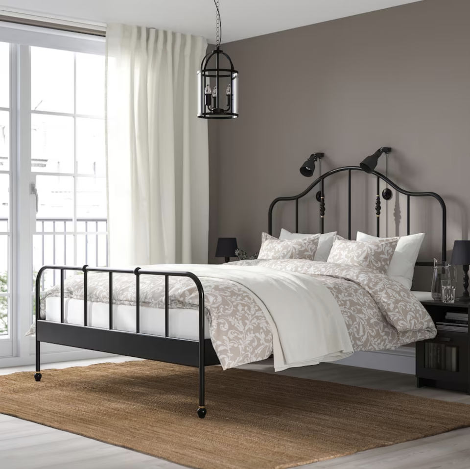 <p><a href="https://www.ikea.com/us/en/p/sagstua-bed-frame-black-s79268901/" rel="nofollow noopener" target="_blank" data-ylk="slk:Shop Now;elm:context_link;itc:0;sec:content-canvas" class="link ">Shop Now</a></p><p>Sagstua Bed Frame</p><p>ikea.com</p><p>$199.00</p>