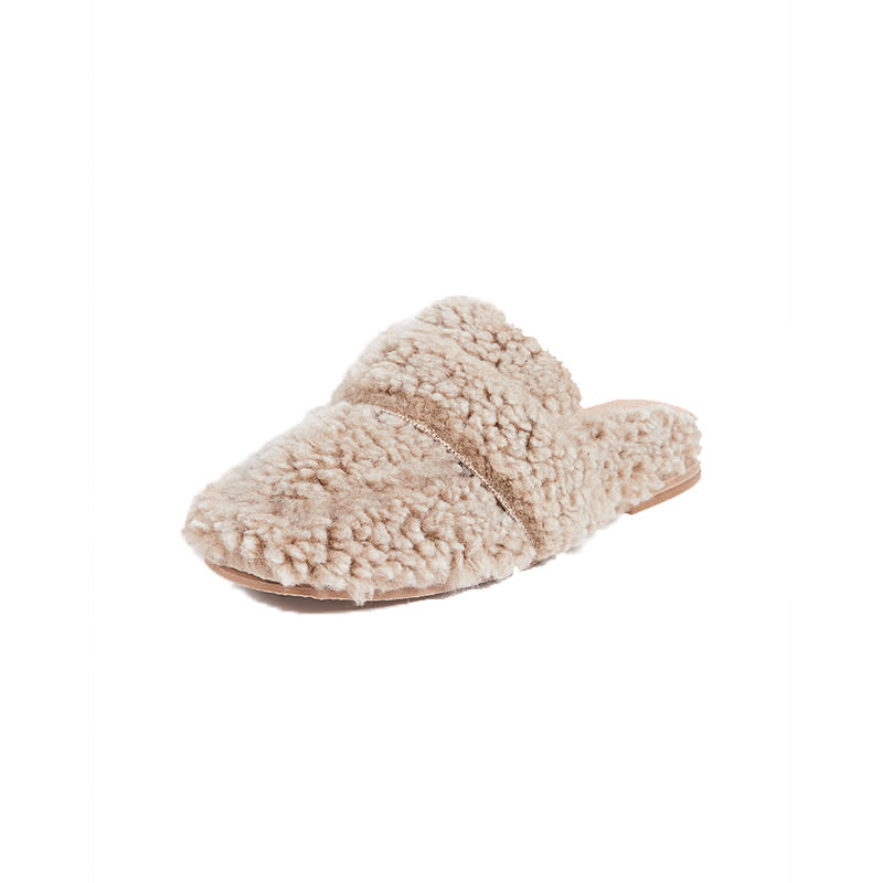 <a rel="nofollow noopener" href="https://go.redirectingat.com?id=86205X1579268&xs=1&url=https%3A%2F%2Fwww.shopbop.com%2Ffaux-shearling-ease-mule-free%2Fvp%2Fv%3D1%2F1530665148.htm%3FfolderID%3D13499%26fm%3Dother-shopbysize-viewall%26os%3Dfalse%26colorId%3D12688%26extid%3Daffprg_linkshare_SB-30KlfRmrMDo%26cvosrc%3Daffiliate.linkshare.30KlfRmrMDo" target="_blank" data-ylk="slk:Faux Shearling At Ease Mules, Free People, $128;elm:context_link;itc:0;sec:content-canvas" class="link ">Faux Shearling At Ease Mules, Free People, $128</a>