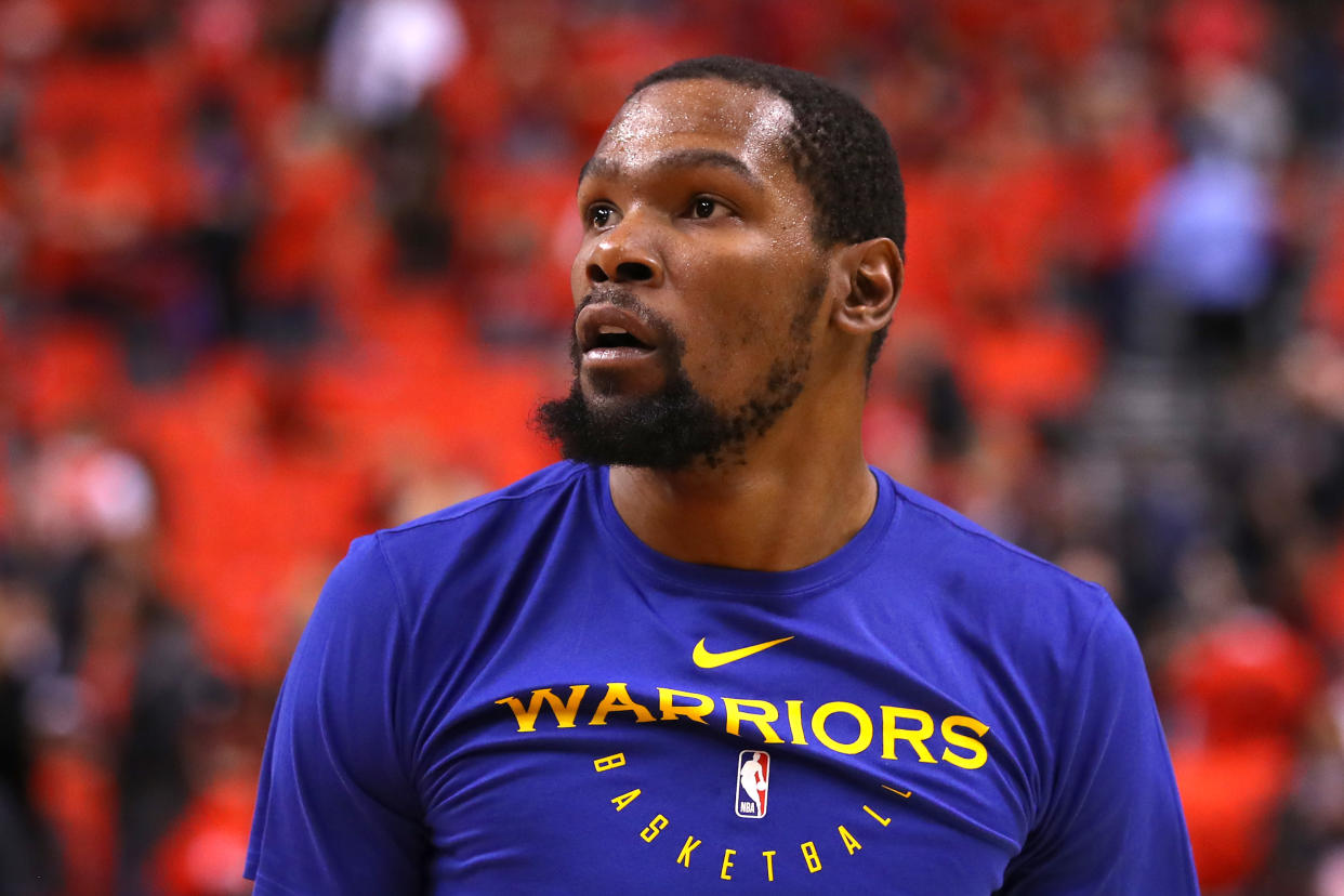Kevin Durant appears to be making the most of his rehab while enjoying summer in California. (Getty)