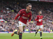 Manchester United's Antony celebrates after scoring the opening goal during the English Premier League soccer match between Manchester United and Burnley at Old Trafford, Manchester, England, Saturday, April 27, 2024. (Martin Rickett/PA via AP)