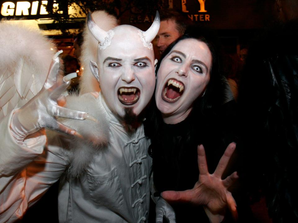 two people dressed as vampire for halloween