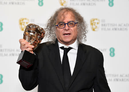 Hank Corwin holds his award for Editing for the film 'Vice' at the British Academy of Film and Television Awards (BAFTA) at the Royal Albert Hall in London, Britain, February 10, 2019. REUTERS/Toby Melville