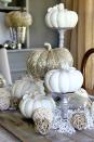<p>Display pretty pumpkins on stands of varied heights for a beautiful effect. </p><p><strong>Get the tutorial at <a rel="nofollow noopener" href="http://www.thistlewoodfarms.com/five-fall-decorating-ideas-for-the-dining-room-and-a-giveaway/" target="_blank" data-ylk="slk:Thistlewood Farms;elm:context_link;itc:0;sec:content-canvas" class="link ">Thistlewood Farms</a>. </strong></p>