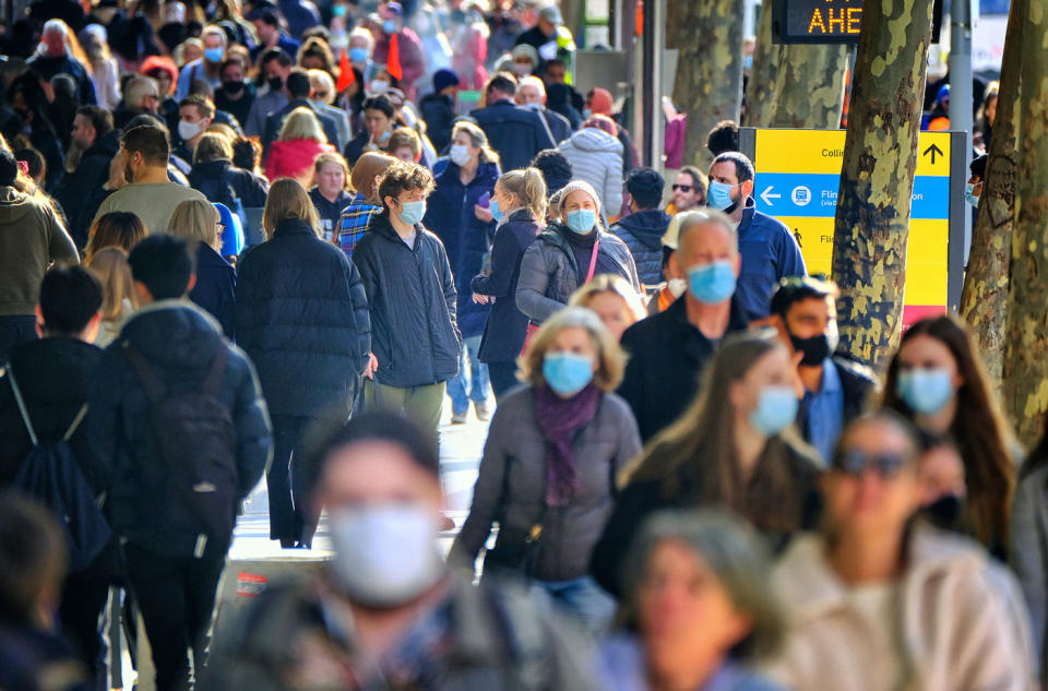 People are seen in the CBD of Melbourne, Thursday, July 8, 2021.