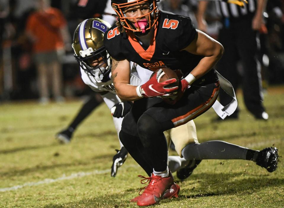 Jayvan Boggs of Cocoa Tigers catches a pass in the FHSAA football Class 2S state semifinal game against Booker Friday, December 1, 2023. Craig Bailey/FLORIDA TODAY via USA TODAY NETWORK