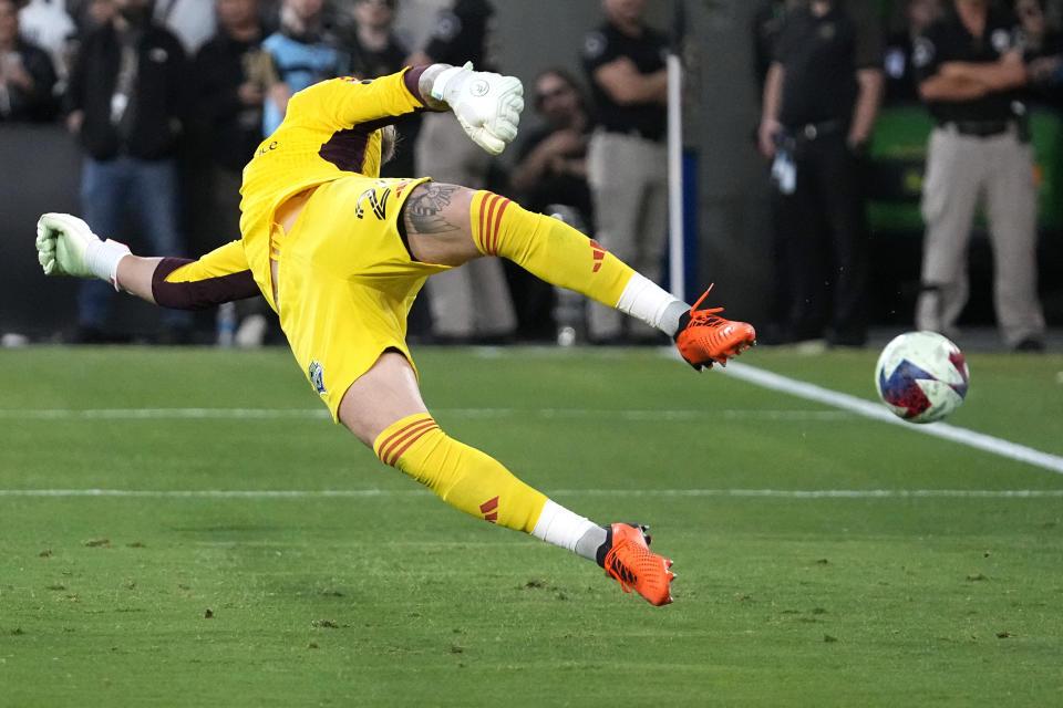Seattle Sounders goalkeeper Stefan Frei deflects a shot away during the first half of a Major League Soccer match against the Los Angeles FC Wednesday, June 21, 2023, in Los Angeles. (AP Photo/Mark J. Terrill)