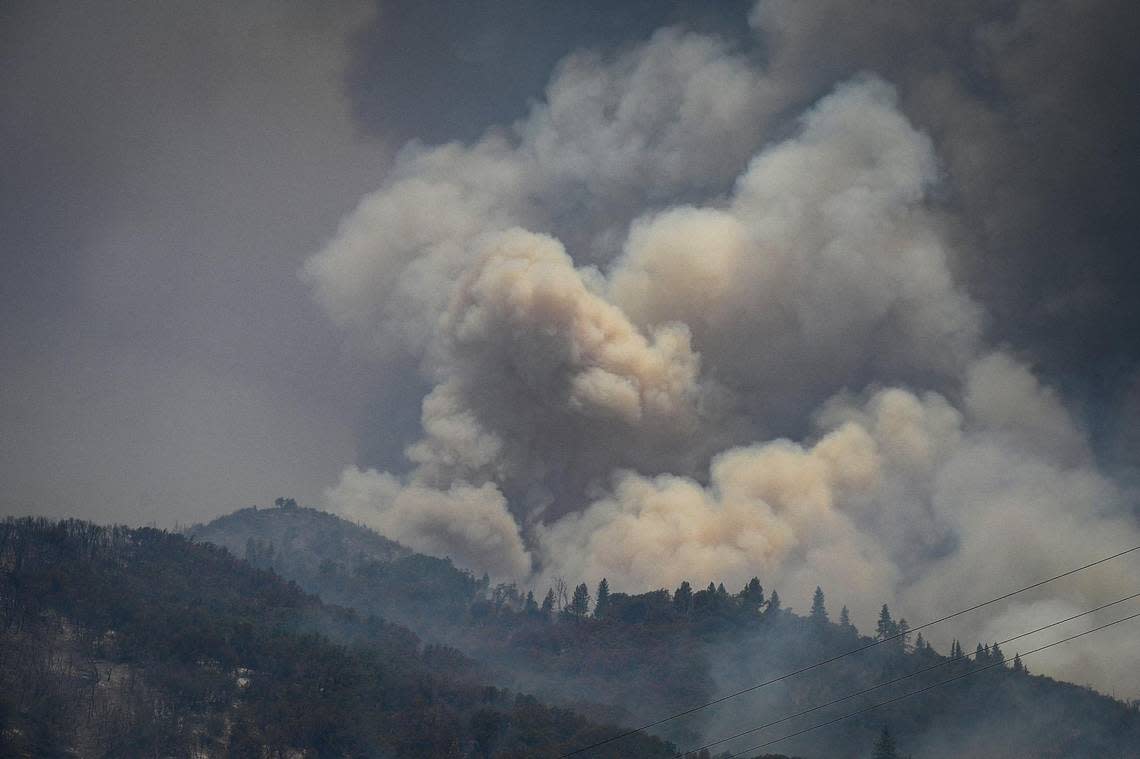 Smoke billows from a mountainside east of Mariposa as the Oak Fire rages near Yosemite National Park in 2022.