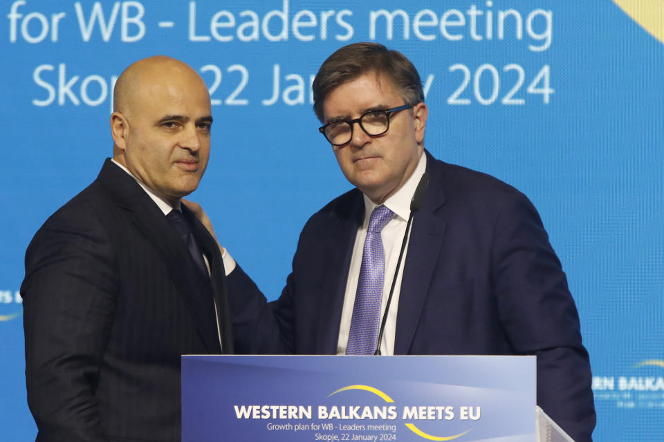 North Macedonia's Prime Minister Dimitar Kovacevski, left stands by U.S. Assistant Secretary of State for European and Eurasian affairs James O'Brien, at the end of their joint news conference after the Western Balkans meets EU, Growth plan for WB - Leaders meeting, in Skopje, North Macedonia, on Monday, Jan. 22, 2024. (AP Photo/Boris Grdanoski)