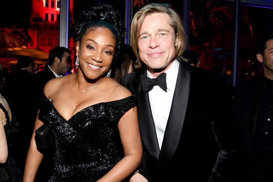 Tiffany Haddish rubs elbows with Oscar-winning Brad Pitt at the 2020 Vanity Fair Oscar Party. 