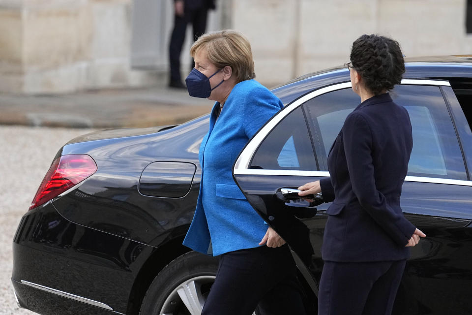 German Chancellor Angela Merkel arrives for a meeting with France's President Emmanuel Macron, at the Elysee Palace, in Paris, Thursday, Sept. 16, 2021. (AP Photo/Michel Euler)