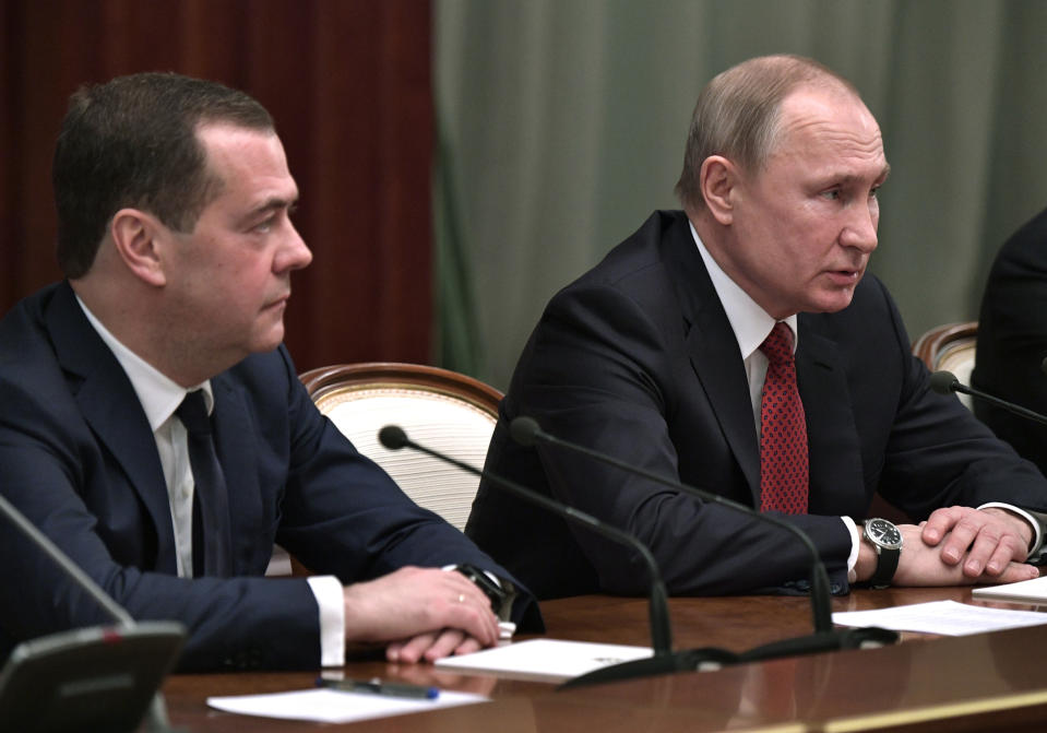 Russian President Vladimir Putin, right, and Russian Prime Minister Dmitry Medvedev attend a cabinet meeting in Moscow, Russia, Wednesday, Jan. 15, 2020. The Tass news agency reports Wednesday that Russian Prime Minister Dmitry Medvedev submitted his resignation to President Vladimir Putin. Russian news agencies said Putin thanked Medvedev for his service but noted that the prime minister's Cabinet failed to fulfil all the objectives set for it. (Alexei Nikolsky, Sputnik, Kremlin Pool Photo via AP)