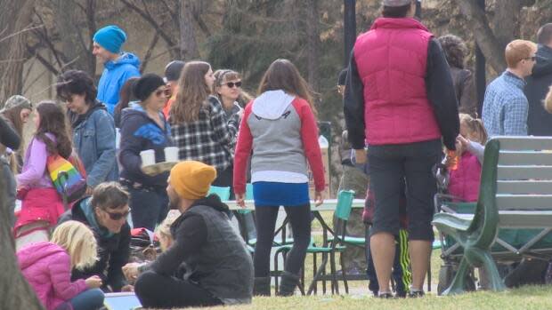 A large crowd attended a maskless children's festival at a downtown Saskatoon park on Saturday in violation of public health laws which limit outdoor gatherings to 10 people. No tickets have been issued.