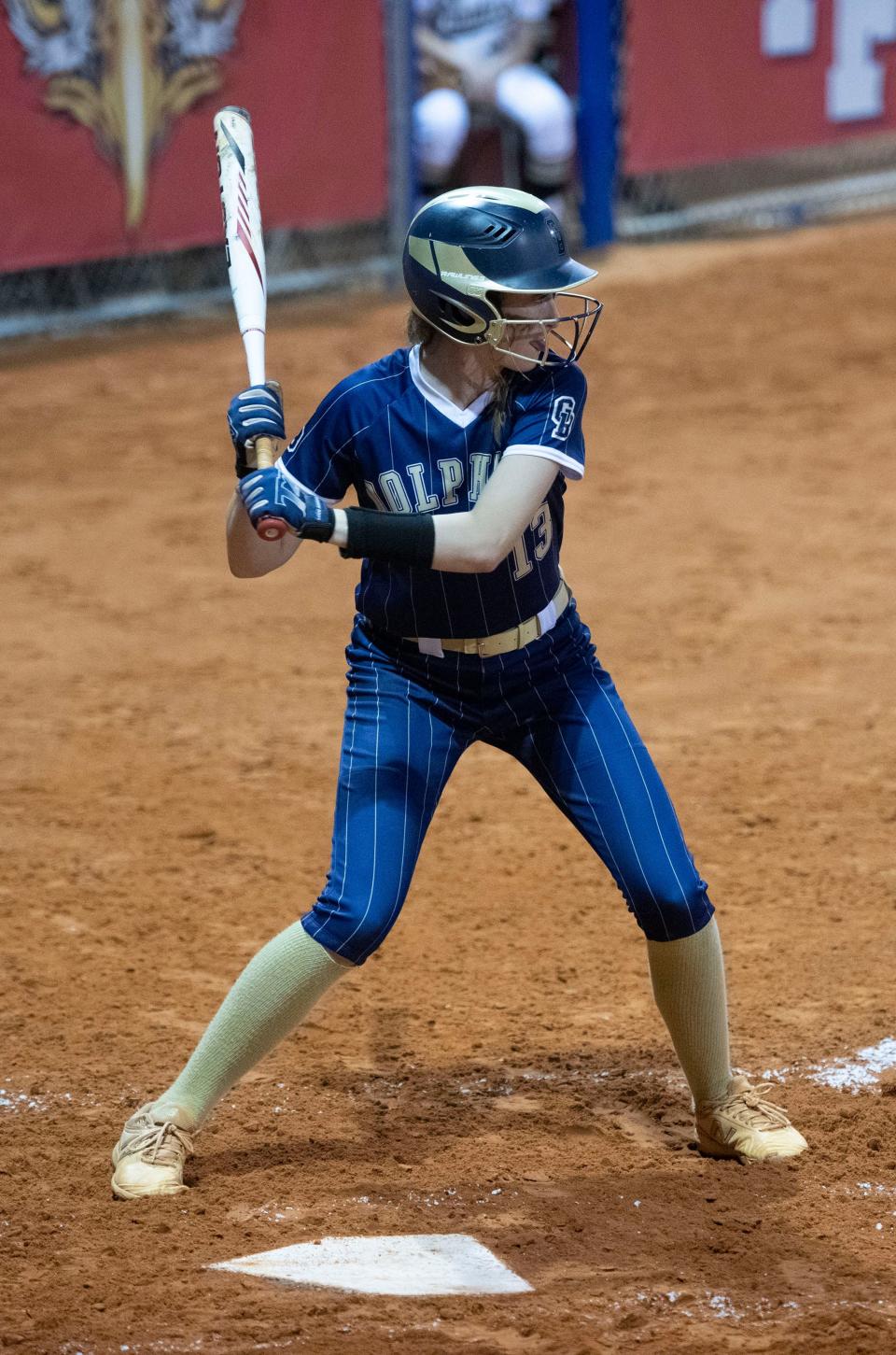 Gulf Breeze High School's Sophia Mislevy waits for the delivery of the Milton pitch during Thursday's District 1-5A softball tournament.