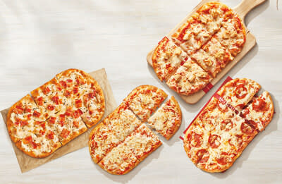 The results are in: Canada loves Tim Hortons Flatbread Pizza! Starting today, Tims Flatbread Pizzas are available across Canada starting at just $6.99* after successful test markets (CNW Group/Tim Hortons)