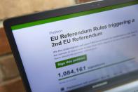 A laptop screen displays a parliamentary petition on the website of the British government, calling for a second referendum on the UK's EU membership