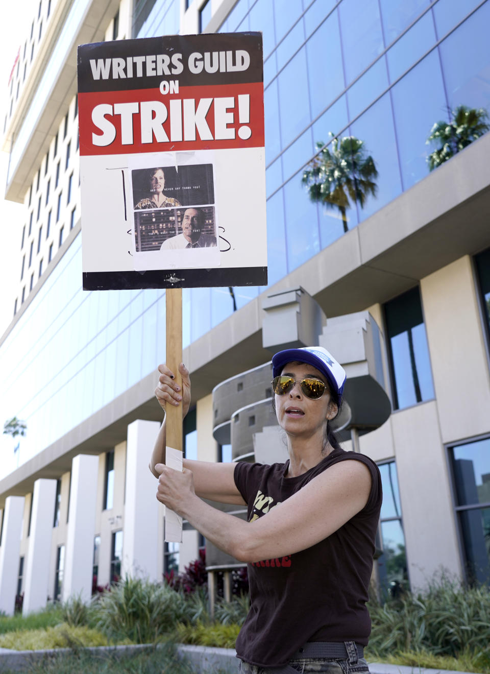 Sarah Silverman, left, pickets outside Netflix studios on Thursday, July 20, 2023, in Los Angeles. The actors strike comes more than two months after screenwriters began striking in their bid to get better pay and working conditions. (AP Photo/Chris Pizzello)